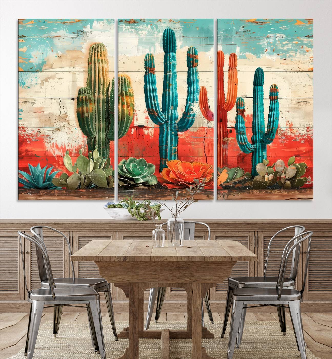 A vivid southwestern-style artwork featuring an eclectic mix of cacti and succulents painted against a textured, rustic wood backdrop in rich turquoise, red, and orange hues.
