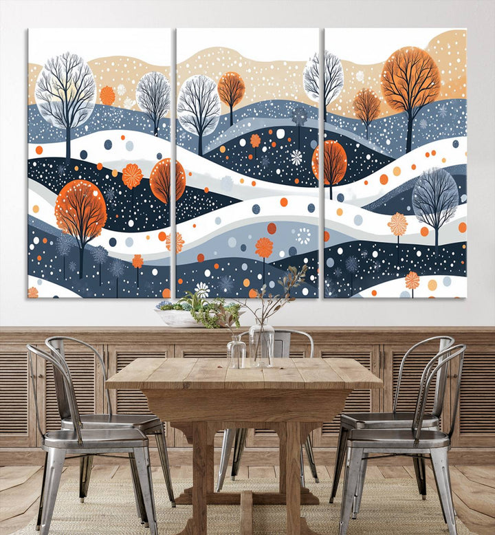 The "Abstract Winter Landscape Canvas Wall Art Print," featuring a triptych of landscapes with trees and hills in vibrant orange, white, and blue hues, adds a gallery-quality finish that transforms the space into an art lover's dream.