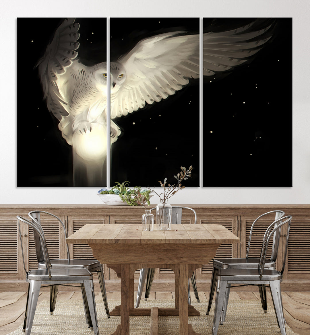 The Night Owl Art graces the wall with its depiction of a snowy owl on a glowing orb, perfect for modern decor.