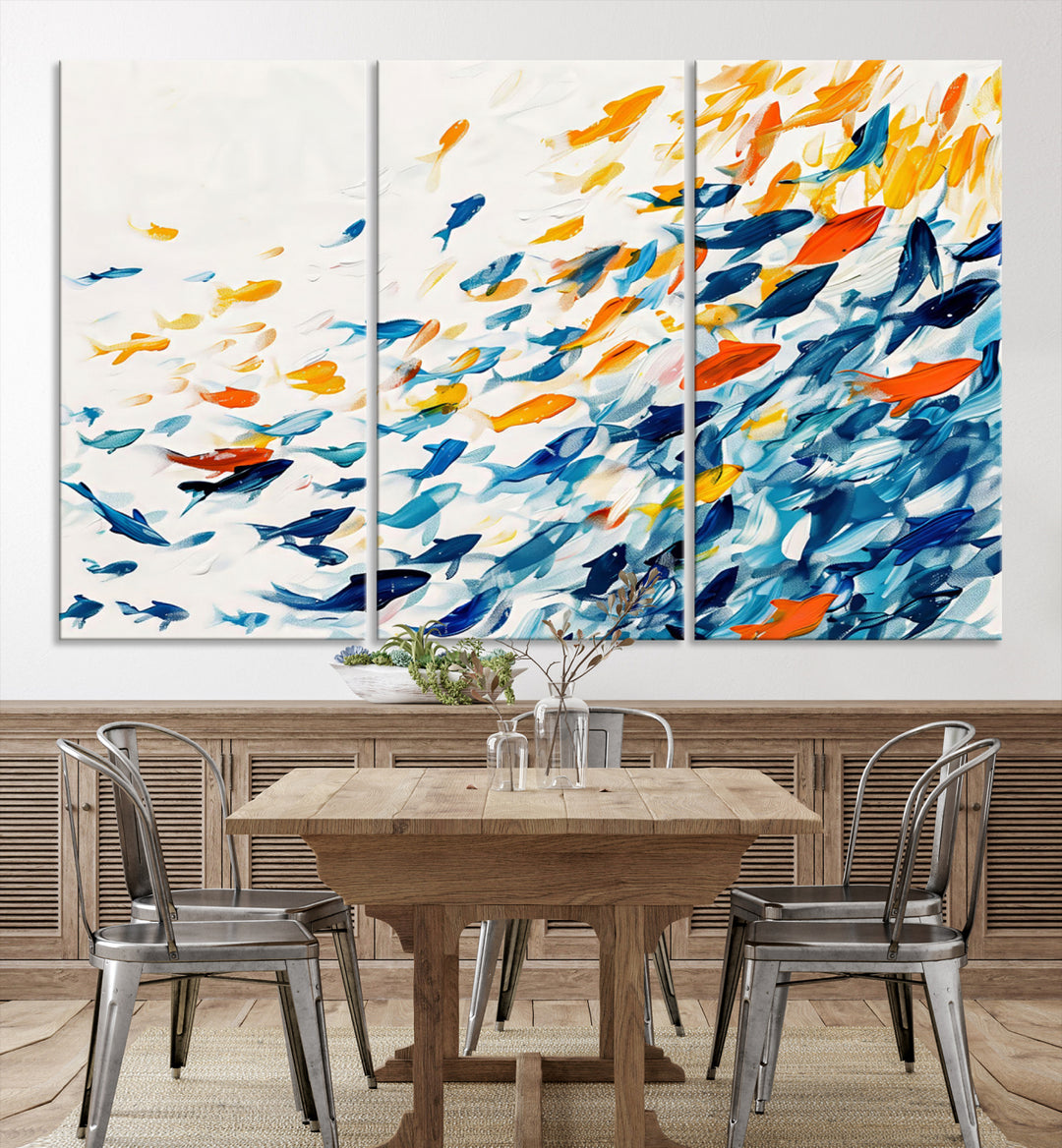 A colorful Abstract Fish Shoal Canvas Print hangs on the wall.