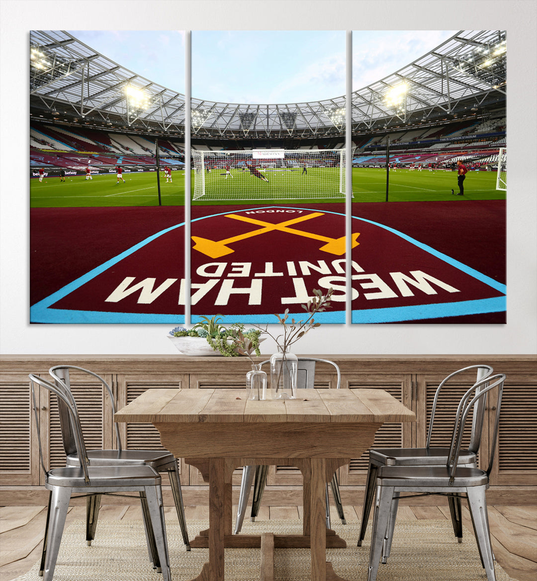 A soccer stadium with the West Ham United FC logo.