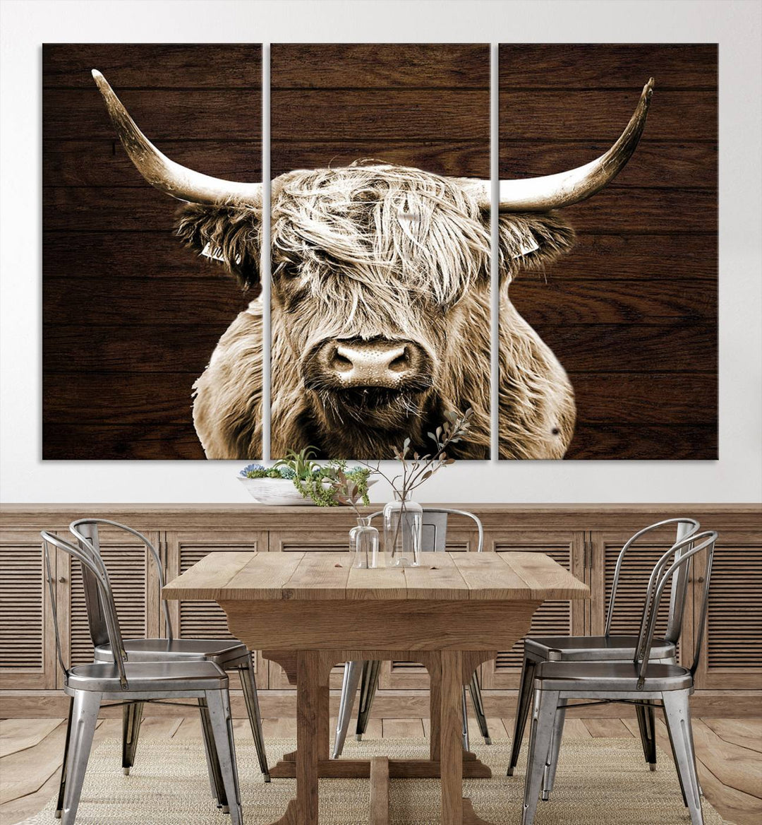 Highland Cow Wall Art Canvas Print: Majestic Scottish bull on rustic decor, ready to hang.