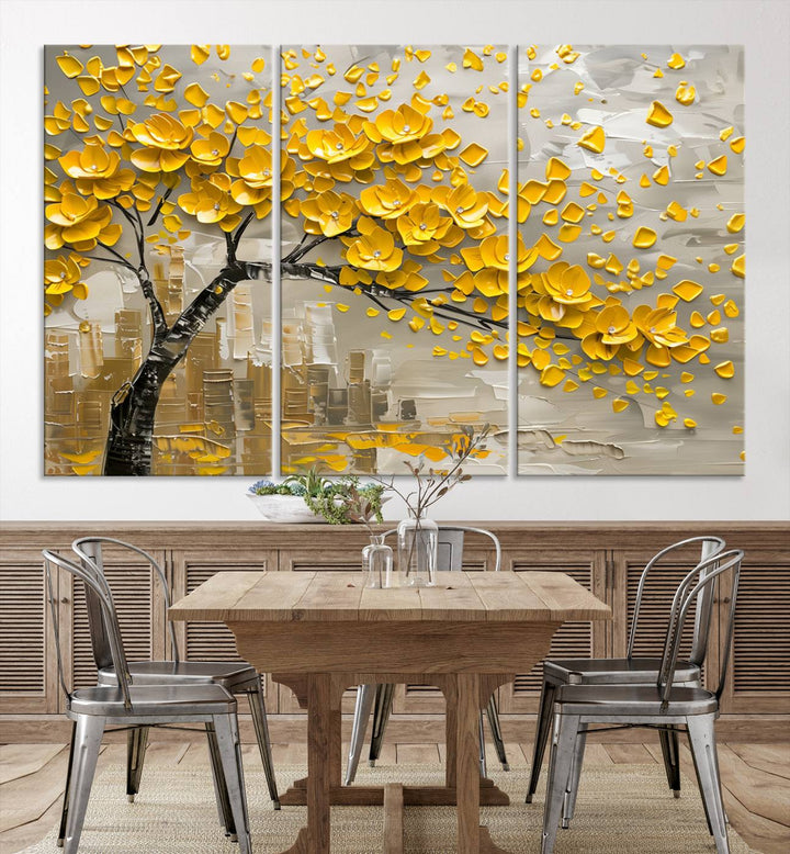 Yellow Blossom Tree Canvas Wall Art, featuring a floral abstract modern design, is elegantly displayed against a dark wall. This sophisticated piece enhances the contemporary aesthetic of the space.