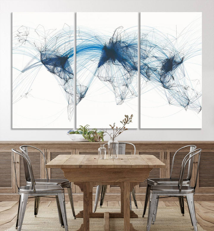 The Aviation Flight Map Wall Art is a set of three abstract panels featuring a world map with blue lines, resembling a flight map. Ideal for aviation enthusiasts, this ready-to-hang framed air traffic art print enhances the appeal of modern decor.