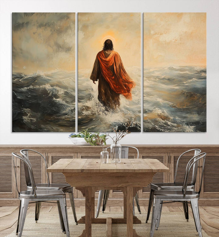 This triptych wall art, titled "Jesus Walking on Water," presents a figure in a red cloak crossing turbulent seas. It is perfect for those looking for religious home decor with a contemporary flair.