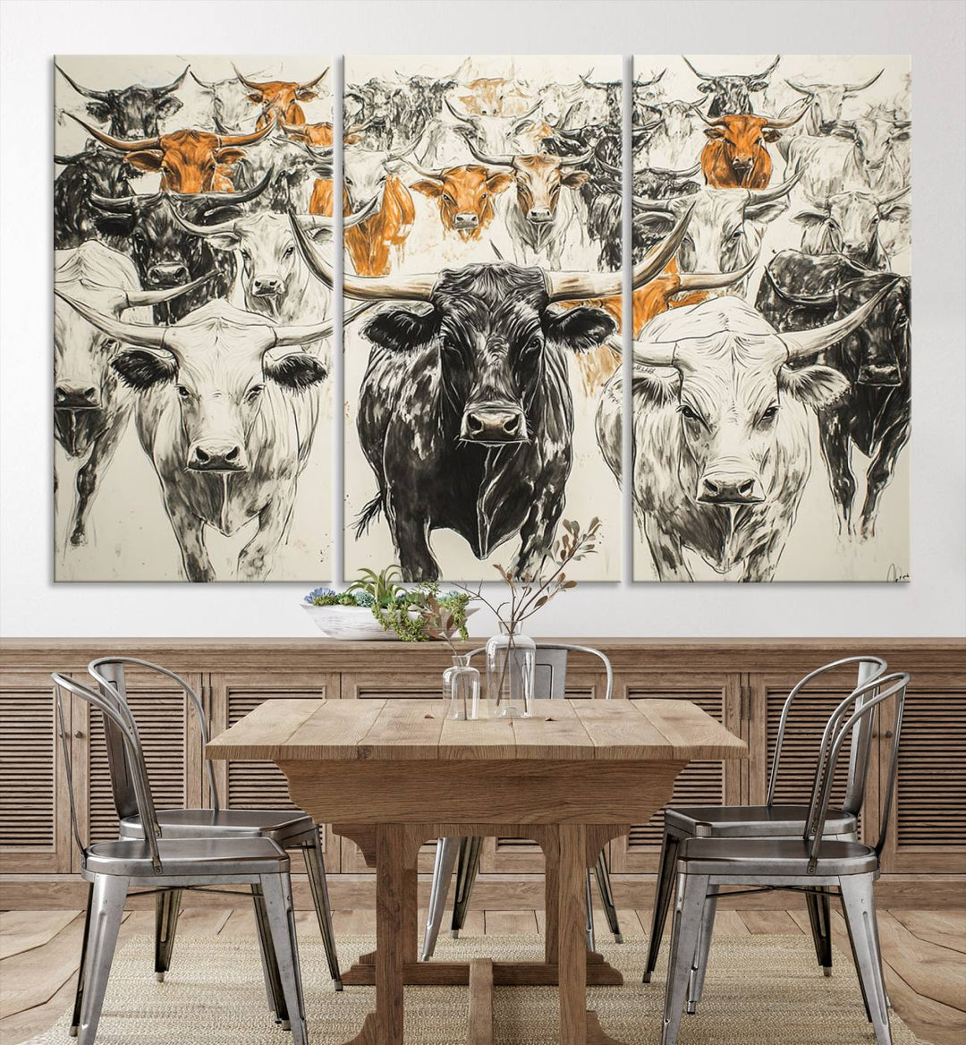 This exquisite farmhouse wall art, titled "Western Longhorn Cattle Canvas Print," showcases a majestic herd of longhorn cattle in a three-panel design. This ready-to-hang and framed barn decor infuses your space with rustic charm.