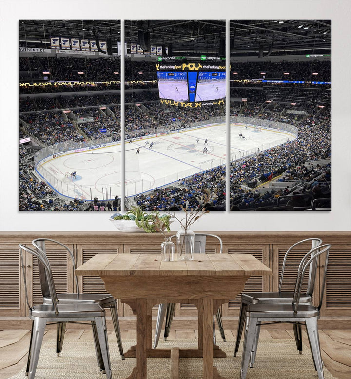 A large Enterprise Center canvas of a crowded hockey arena hangs prominently.