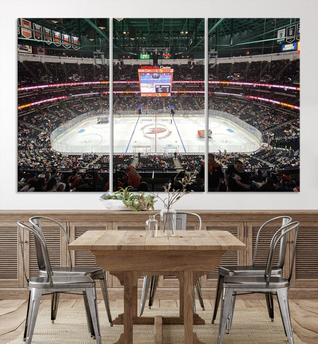 The wall art of the Honda Center California Anaheim Ducks Ice Hockey Stadium features a depiction of the rink and scoreboard from the perspective of the upper deck.