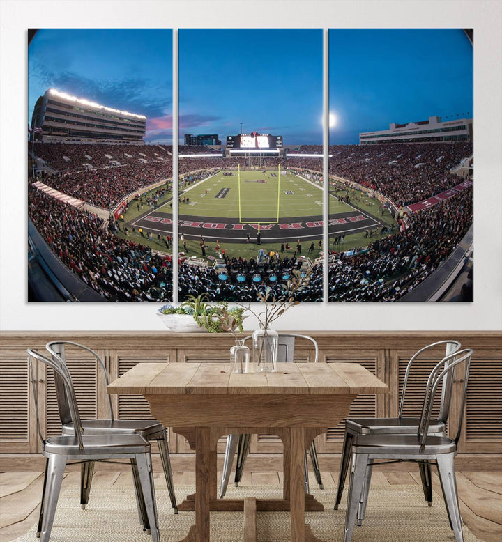 The wall art in the living room features a Texas Tech Red Raiders Football Team Print, showcasing Jones AT&T Stadium at dusk.