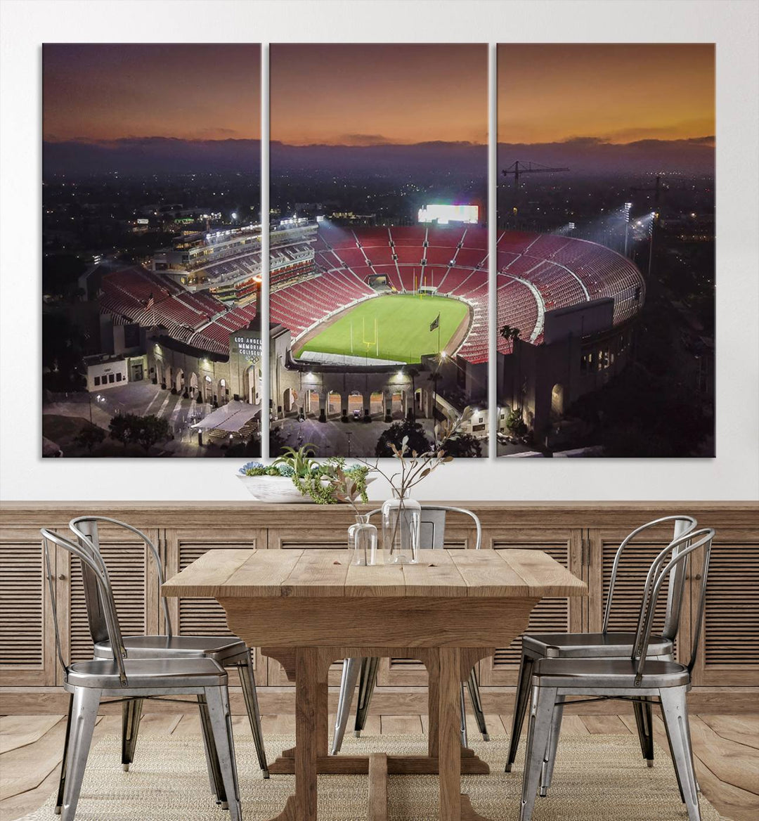 The USC Trojans Stadium canvas captures Memorial Coliseum at twilight, showcasing red seats and a green field beneath an orange sky.