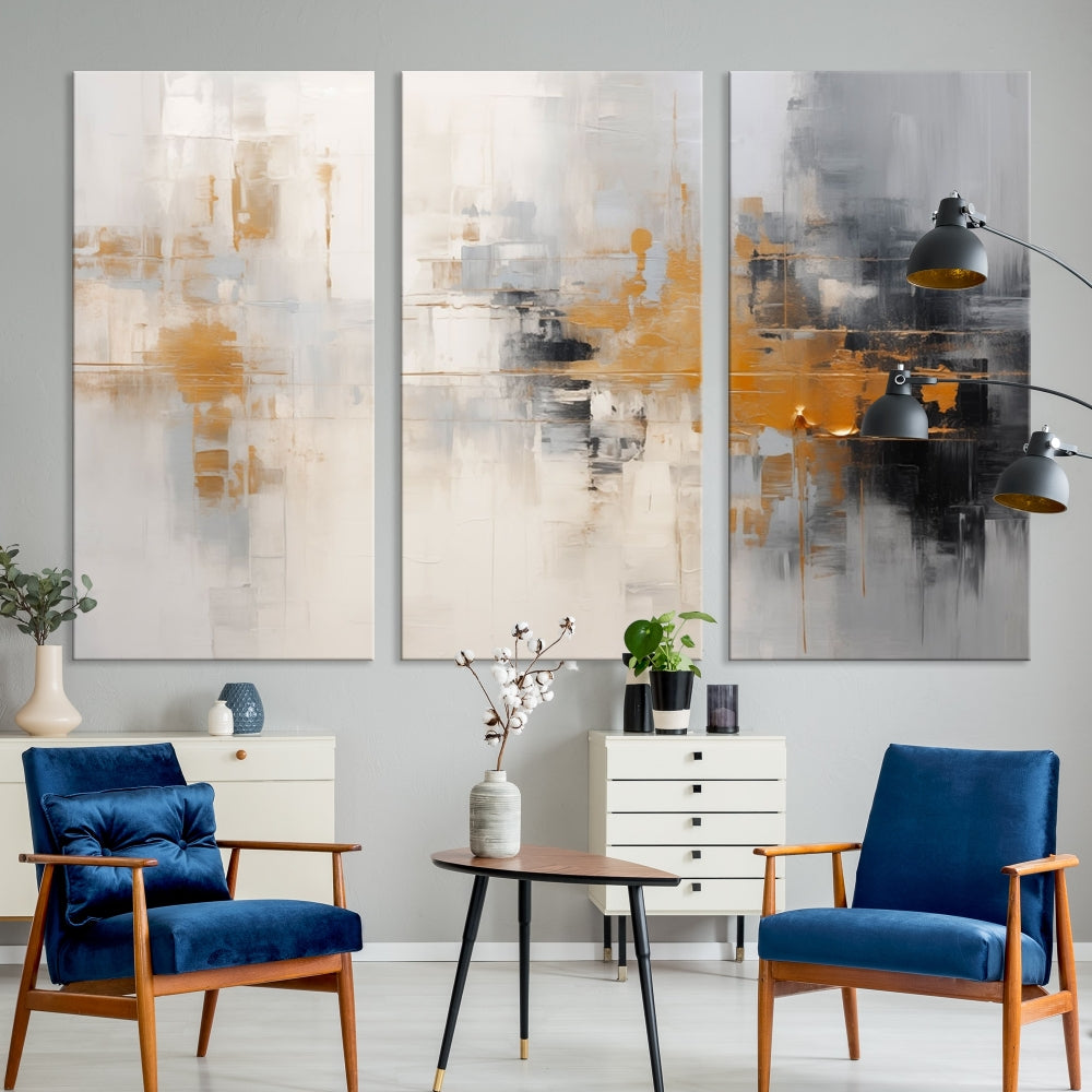 The Orange Pastel Abstract Wall Art Canvas Print, featuring a triptych of orange, white, and black hues, is elegantly displayed on museum-quality canvas.