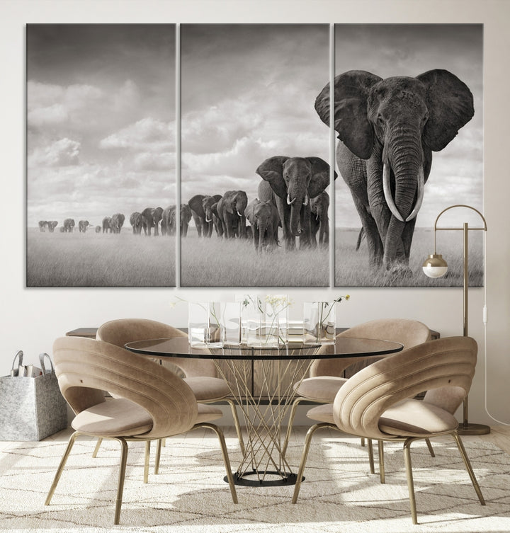 The Elephant Wall Art Canvas Print features a triptych of elephants in a savanna, elegantly displayed.