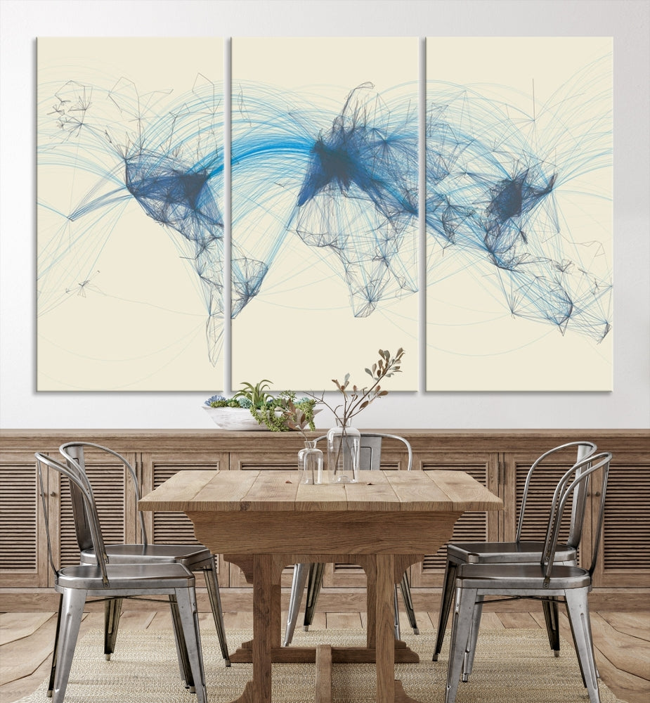 The Flight Routes Map art, featuring an abstract world map with blue connections representing global networks, is a three-panel canvas wall art piece.