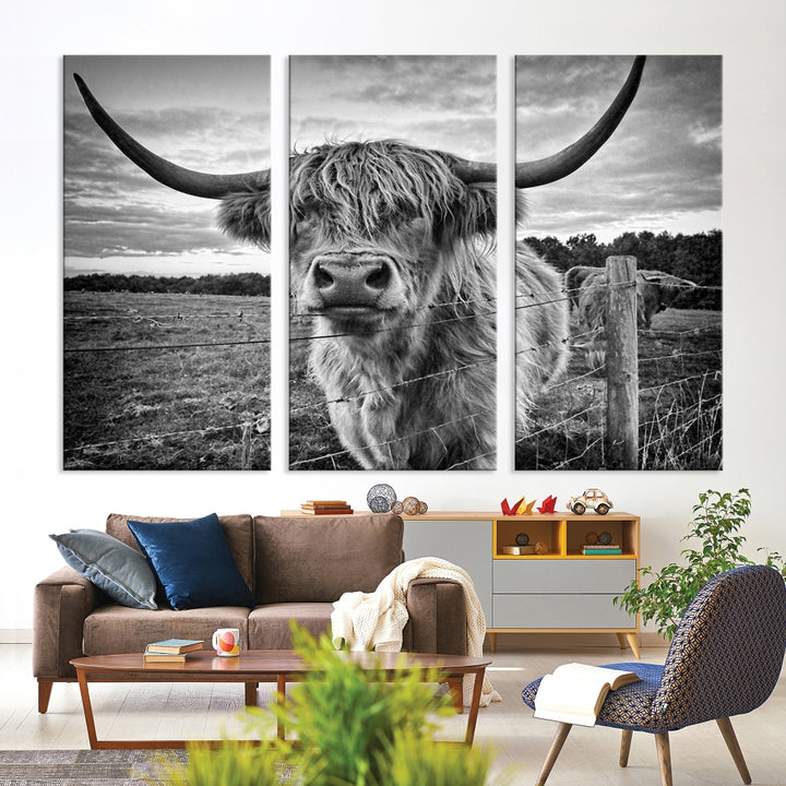 The "Scottish Highland Cow Canvas Wall Art Farmhouse Decor" adds a touch of rustic charm to your living room wall above the couch.