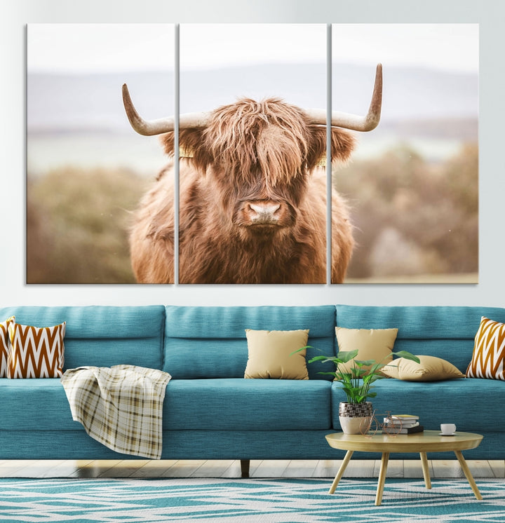 Canvas wall art featuring a Highland cow with long, shaggy fur in natural pastel tones, ready to hang.