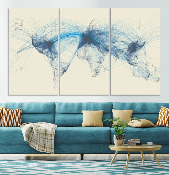 The Flight Routes Map art, featuring an abstract world map with blue connections representing global networks, is a three-panel canvas wall art piece.