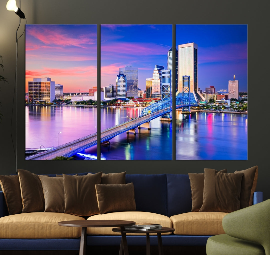 The Jacksonville Wall Art Canvas Print, showcasing the Jacksonville cityscape over a river at sunset, is elegantly crafted on museum-quality canvas with a UV-protective coating. Ready to hang, it elevates your space with its sophisticated charm.