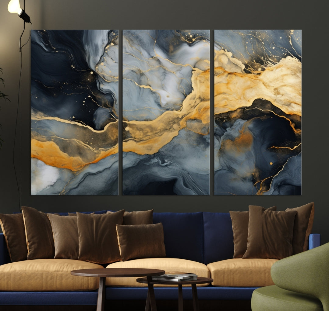 The living room features the Golden Gray Abstract Wall Art Print Contemporary Art Canvas Design, a triptych showcasing gold, black, and gray swirls. Crafted on museum-quality canvas and ready to hang, this piece is designed for elegance and durability.