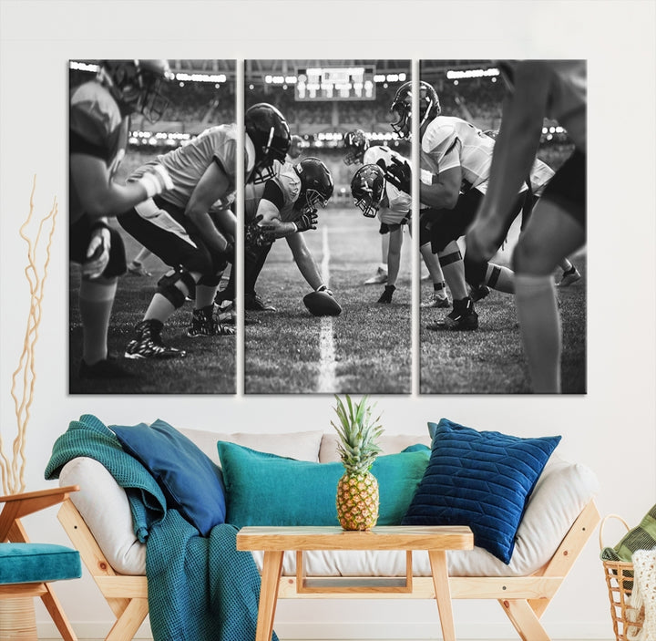 The "American Football Match Wall Art Canvas Print," featuring a black and white photo of a football game, is displayed as a triptych. This artwork is printed on museum-quality canvases and protected with a UV-coating.