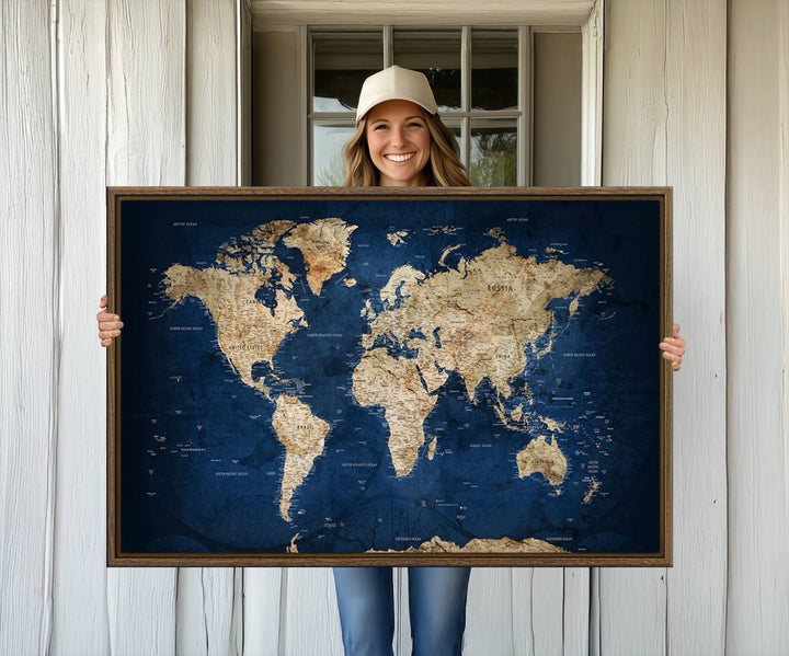 Classic Vintage Blue World Map Canvas Print featuring beige continents against a deep blue background.