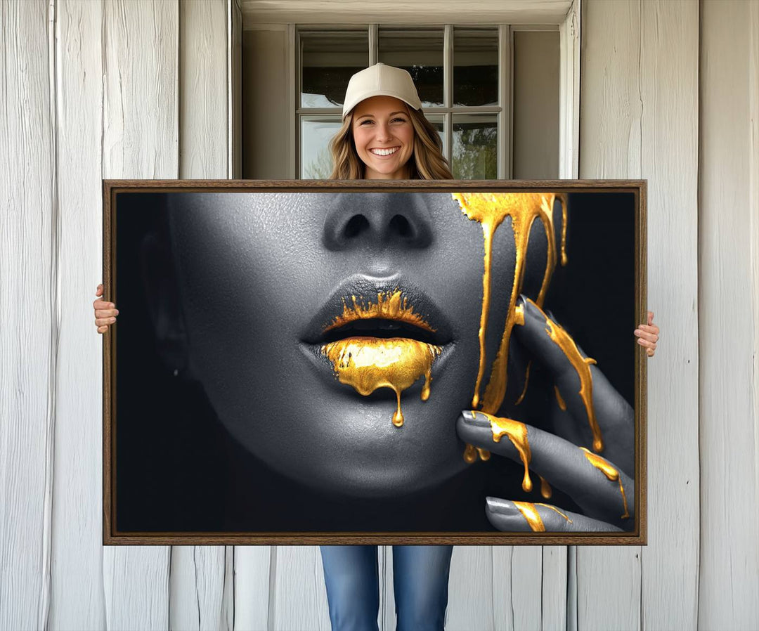 The Gold Lips and Black Woman Makeup Canvas Print features a chic monochrome face design, making it ideal for a modern dining room.