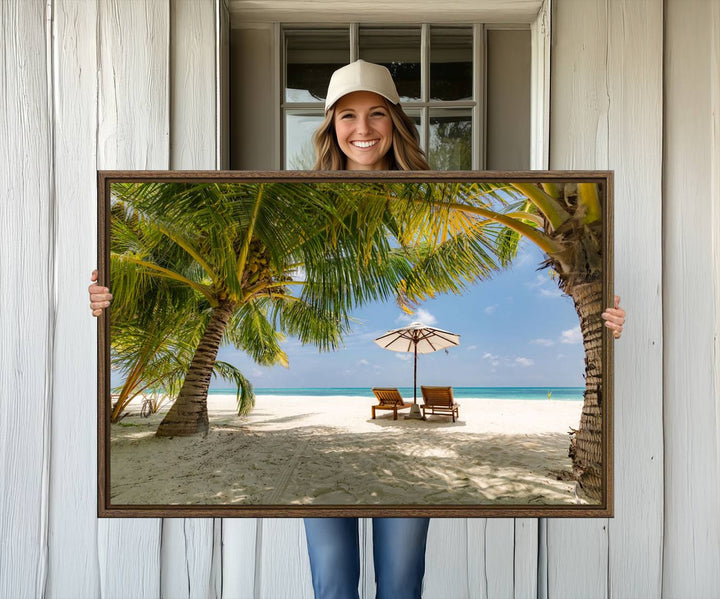 The canvas art print titled Lounge Chairs Palm Trees on Tropical Beach offers free shipping.