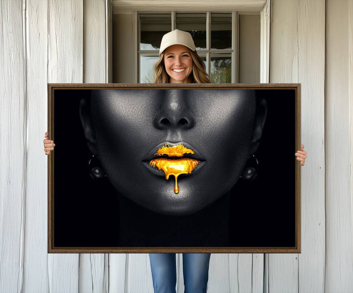 The Honey Gold Lips and Black Woman Photograph canvas print adds a striking touch to the room.