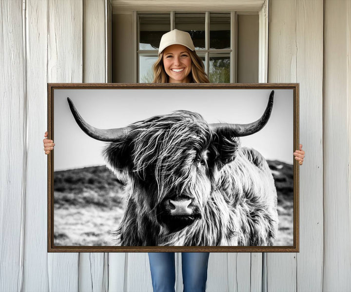 A Black and White Scottish Cow Canvas Print adorns the kitchen wall, perfect for farmhouse decor.