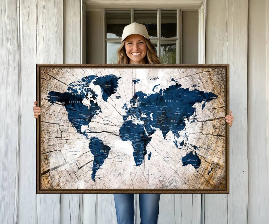 The living room exudes style with the Blue World Map Canvas Wall Art, a rustic-style triptych that's prominently displayed on the wall. This global decor piece adds an elegant touch to the space.