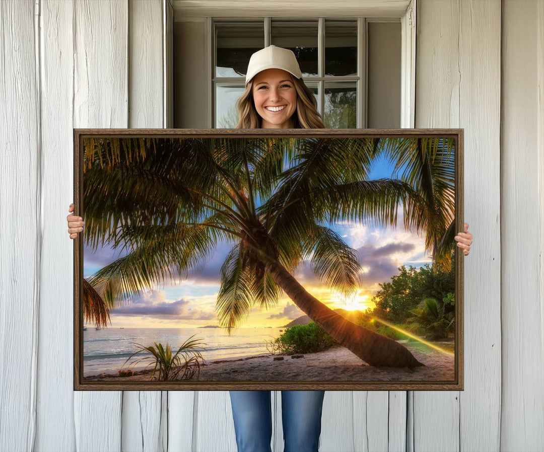 A Coastal Sunset Palm Tree canvas print hangs prominently.