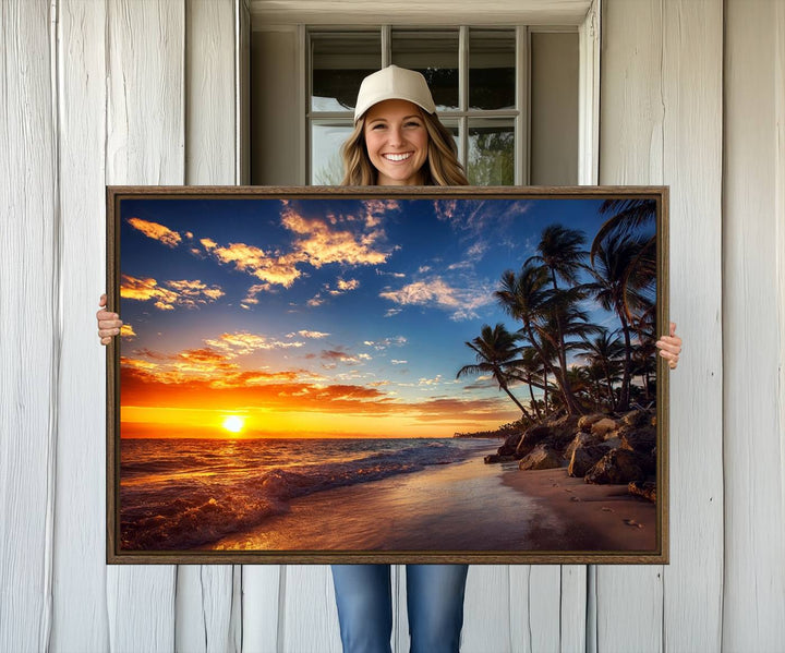 A stunning Tropical Beach Sunset Canvas Art featuring palm trees and ocean waves, created as a Giclee print.