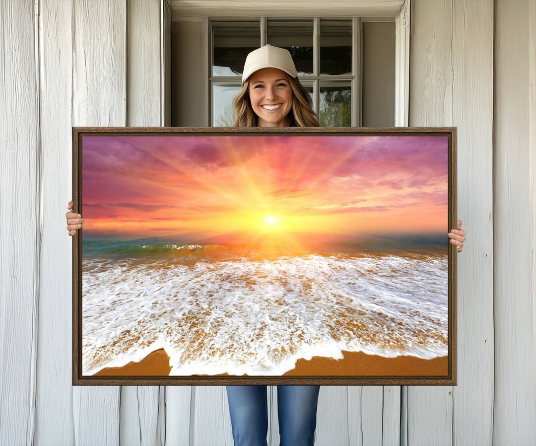 Golden Beach Sunrise 3-panel canvas art of ocean waves, hung on a wooden wall.