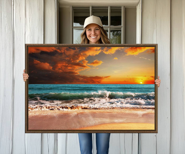 A Golden Sunset Beach triptych seascape canvas hangs on the wall.