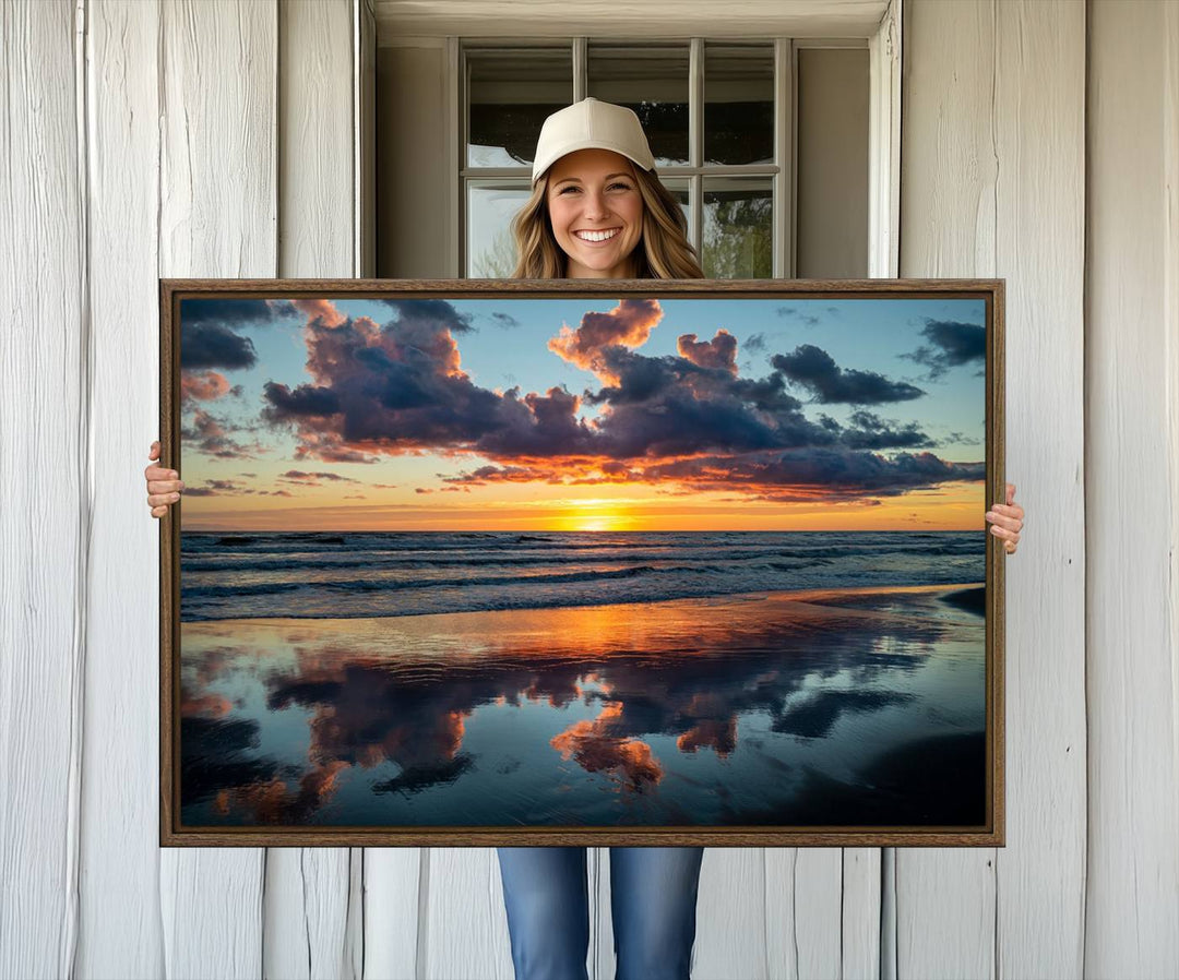 A Beach Sunset Print - Stunning Ocean Canvas Artwork adorns the wall.