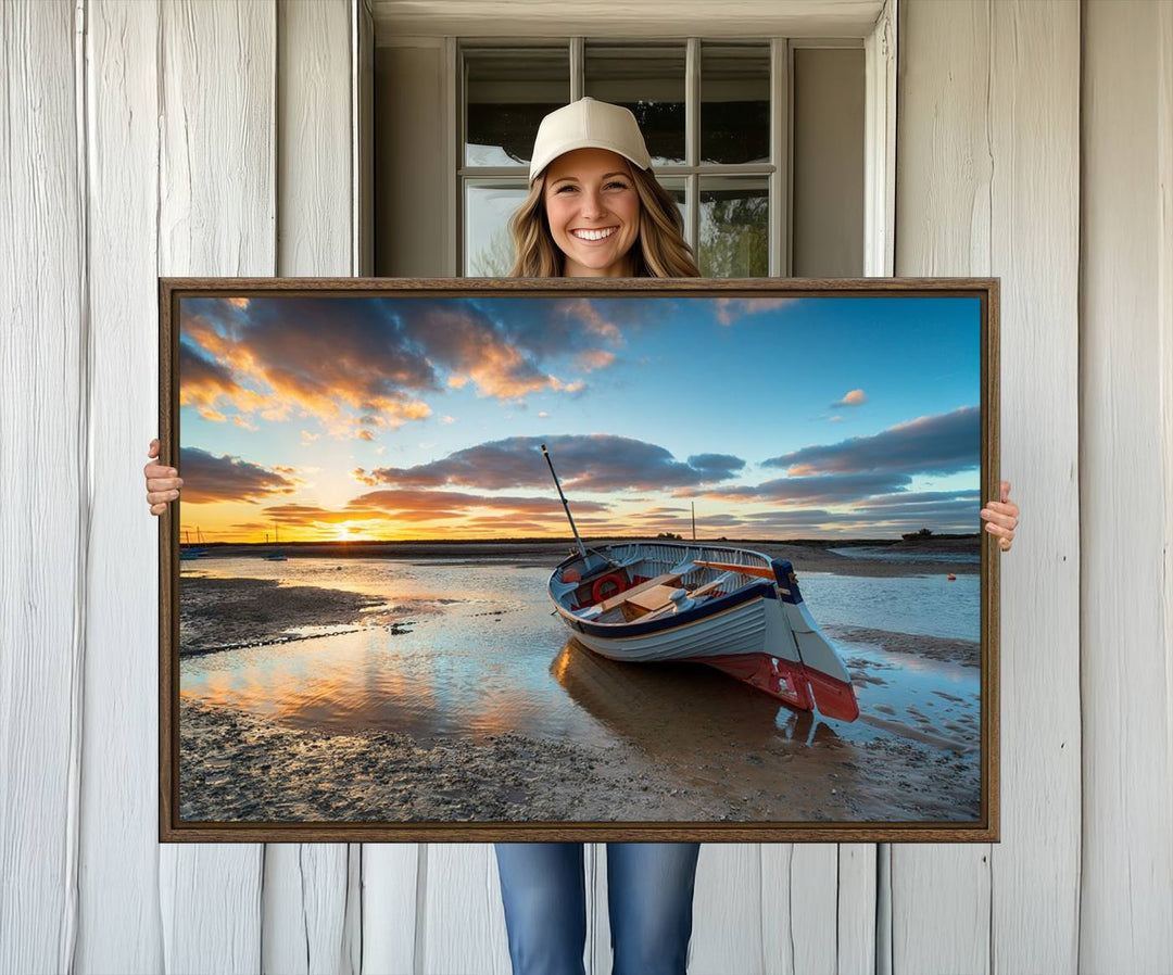 The Small Boat At The Beach Sunset wall art canvas print features UV coating, is museum-quality, and is ready to hang.