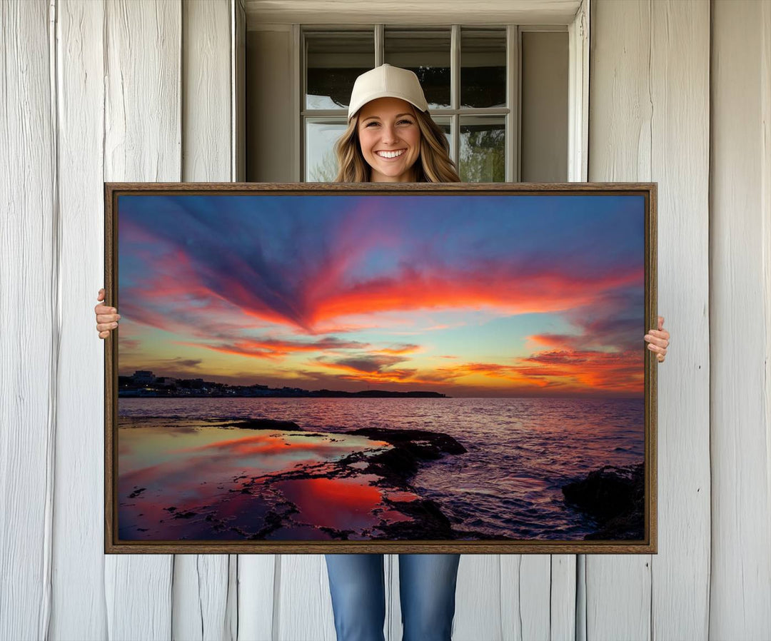 The Glorious Sunset on The Beach canvas print adorns the dining room.