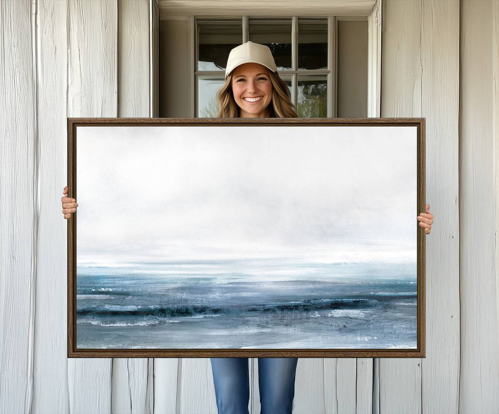 The dining area features Blue Ocean Abstract Artwork on canvas.