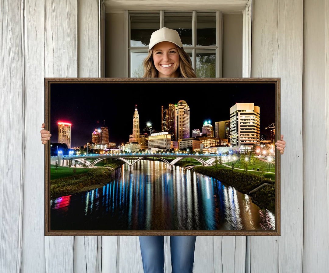 The Columbus City Lights Night Skyline Wall Art Canvas Print adorns the wall.