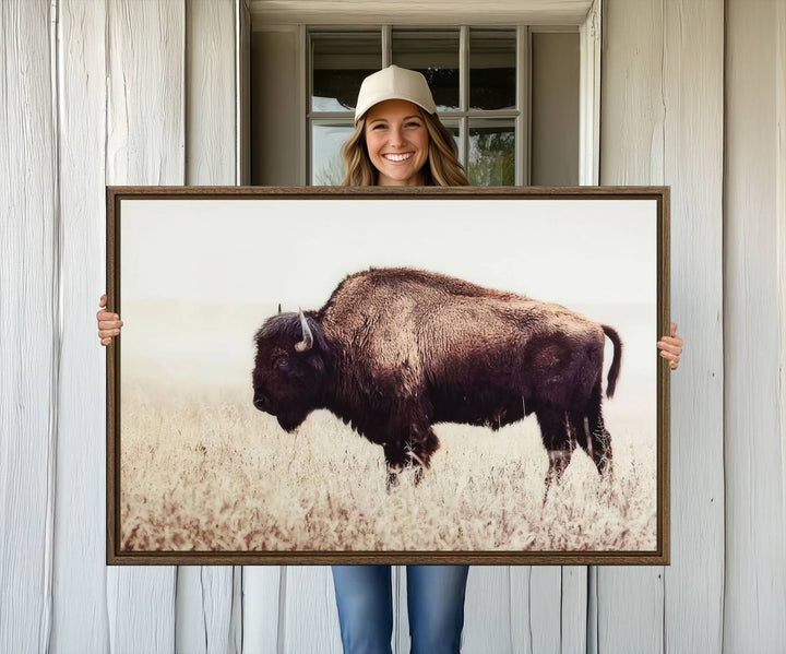 The dining room showcases the Bison in Field canvas print.