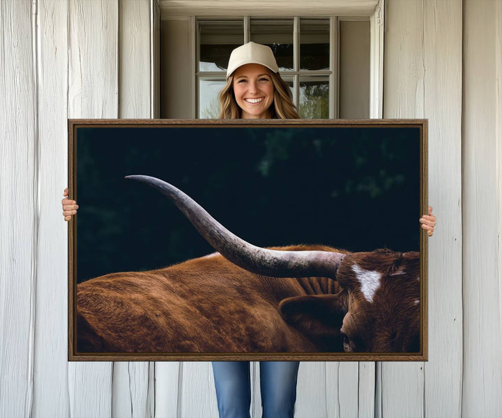 The kitchen dining area features a Texas Longhorn Bull wall art.