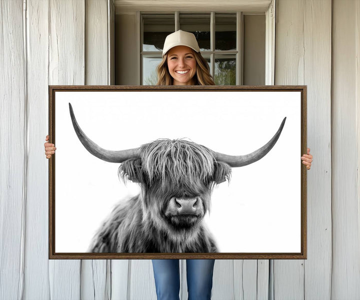 A Scottish Highland Cow Art Canvas adds charm to the farmhouse decor.