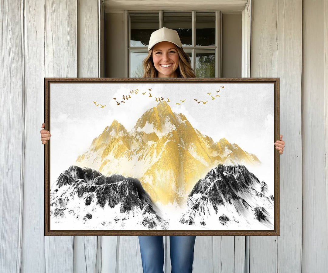 Golden Mountain Triptych Wall Art features gold-tinted mountains and birds.