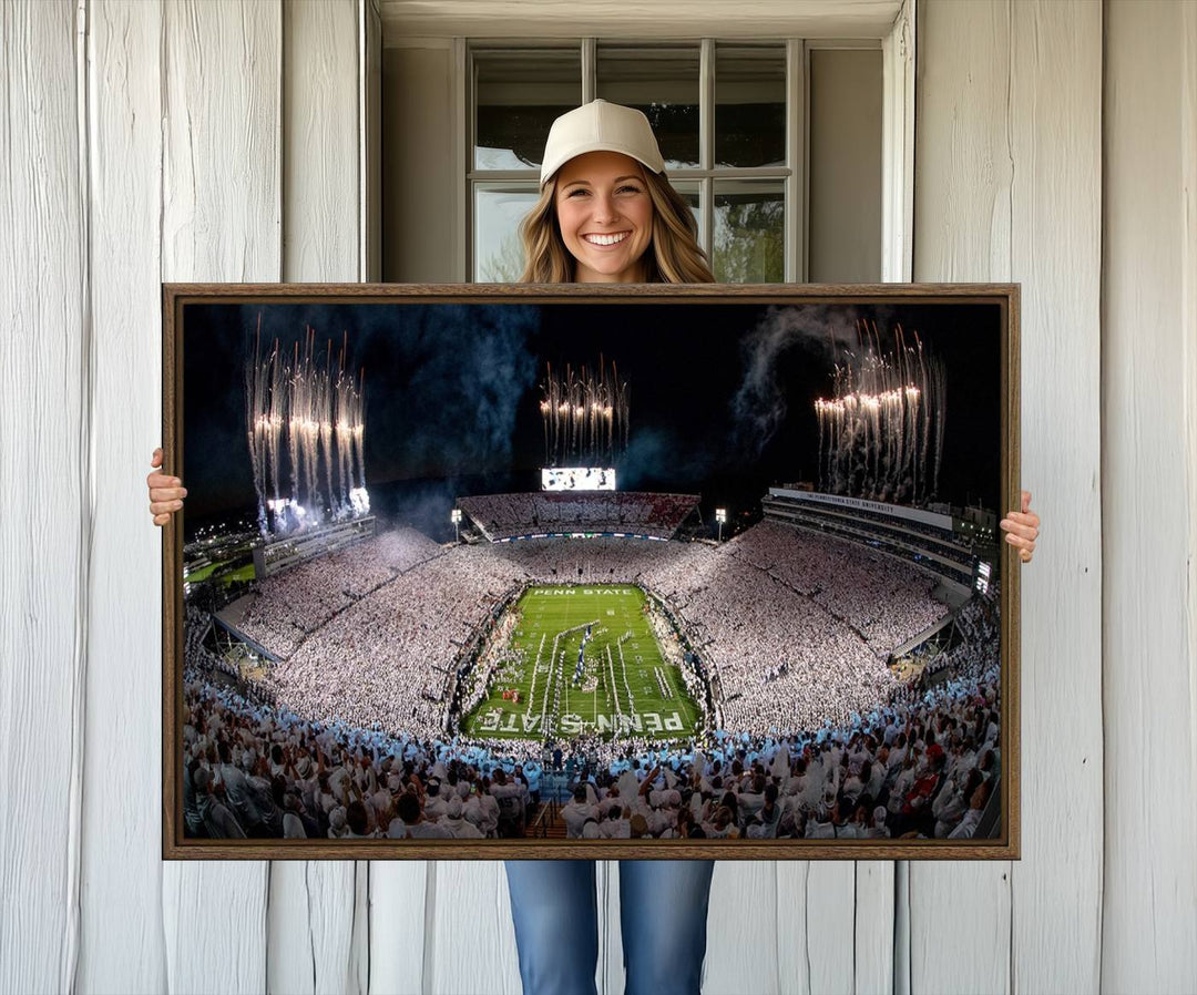 The perfect Penn State Football canvas wall art features a depiction of Beaver Stadium filled with fans in white, with fireworks exploding above.