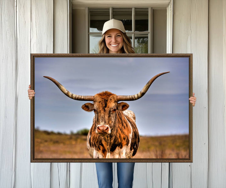 The Texas Longhorn Wall Art Print is displayed in a stylish living room.