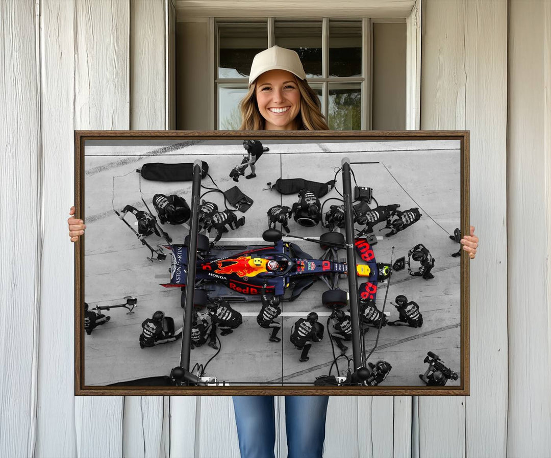 Red Bull Formula 1 Canvas Wall Art Print: An aerial view of a Formula 1 pit stop featuring a Red Bull car on premium canvas.