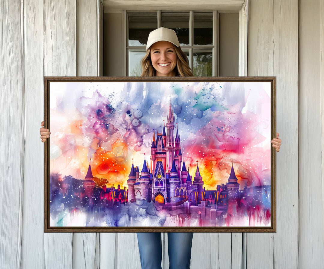 The watercolor Disney Wall Art showcases Cinderellas Castle in pink, purple, and orange hues.