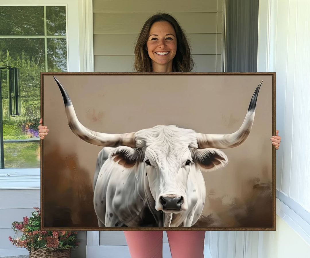 The kitchen features a striking canvas print of a Longhorn Bull.