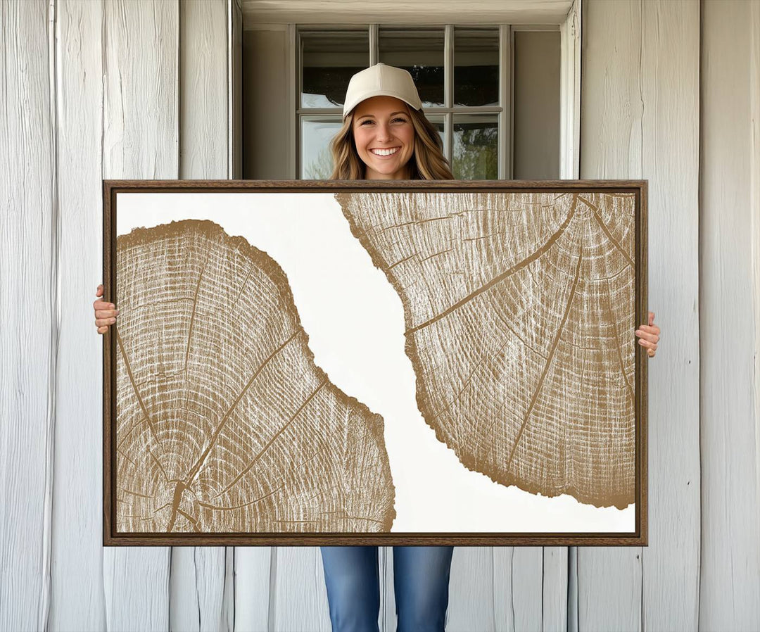 The rustic wall art features two large tree rings, beautifully framed and displayed to create a nature-inspired décor.