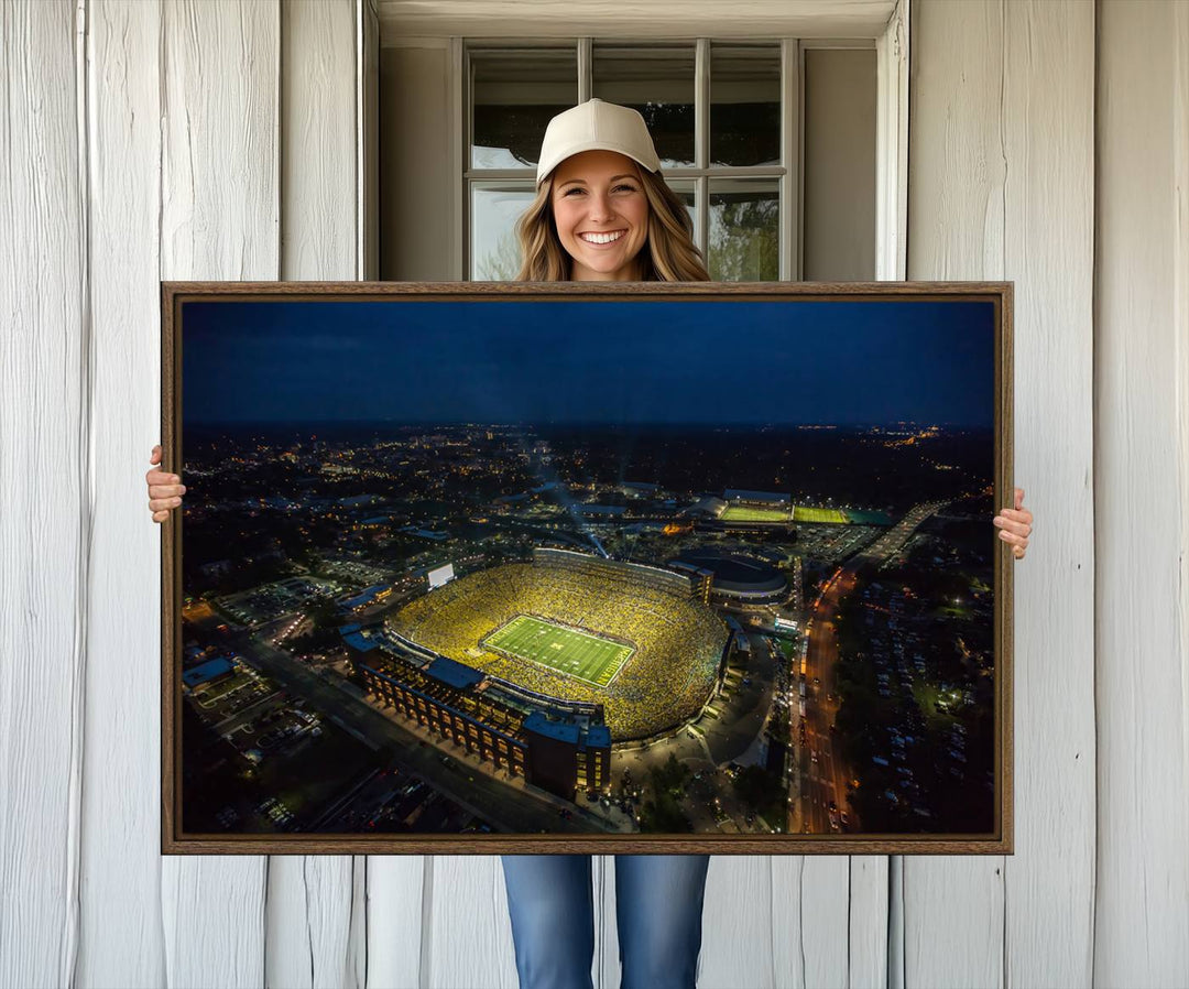 Aerial view of Michigan Stadium nightlife on canvas – Framed, ready-to-hang sports arena wall art.