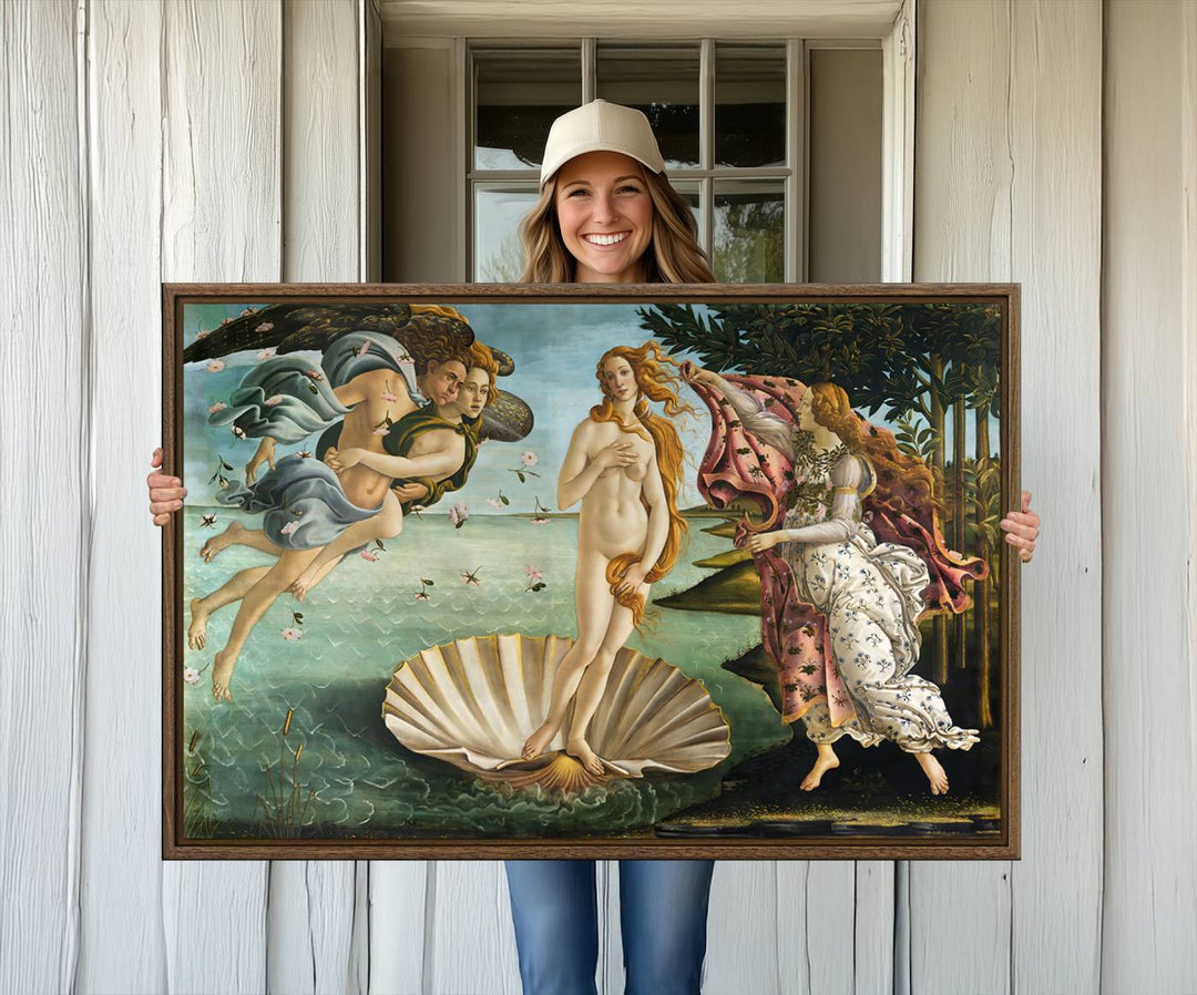 A canvas print of Botticellis The Birth of Venus is displayed on the wall.